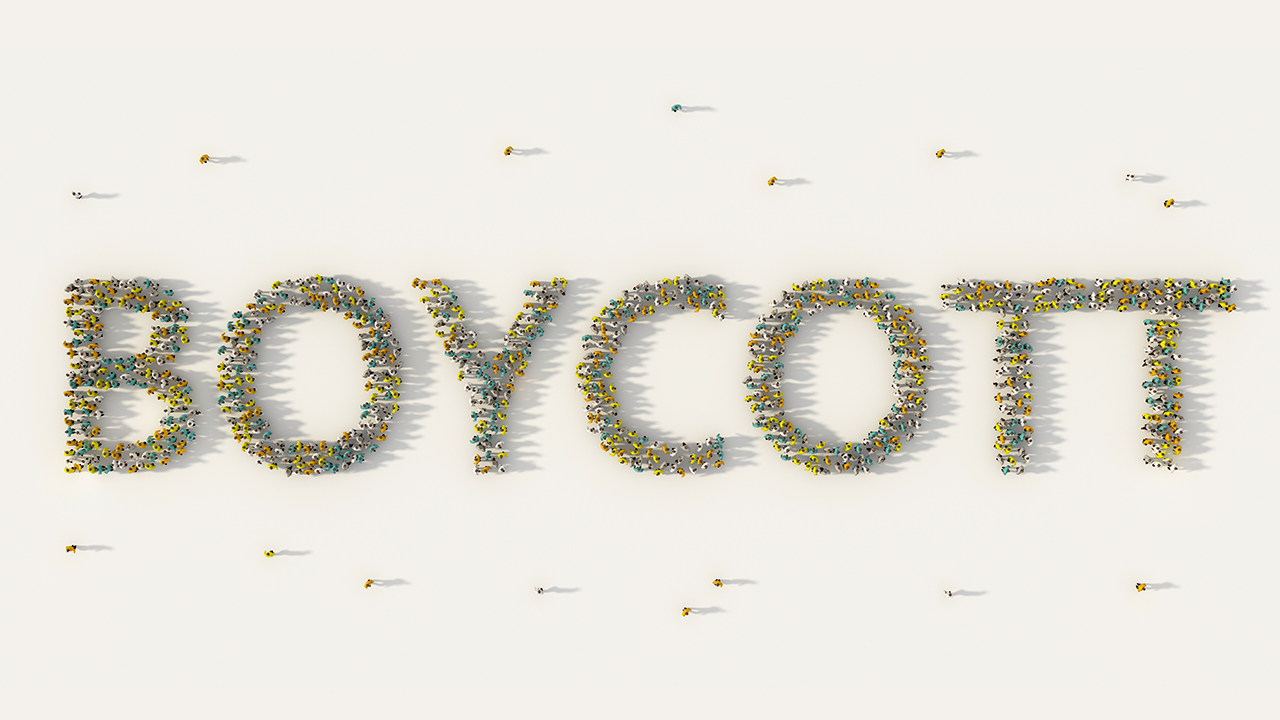 The word boycott spelled with a large crowd.